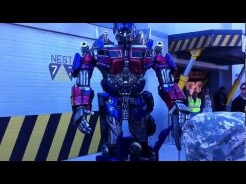 Transformers characters meet guests outside attraction under construction at Universal Orlando