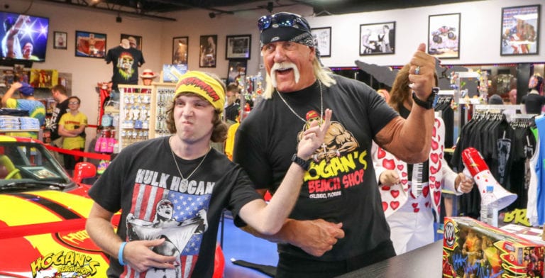 Wrestling superstars Hulk Hogan and Jimmy Hart greet fans at Hogan’s Beach Shop Orlando on Oct. 28