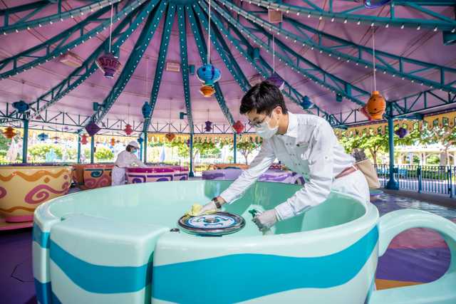 Cleaning a teacup at Hong Kong Disneyland