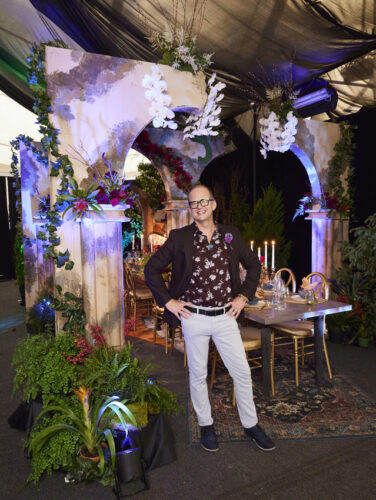 Brian Morrow in front of Gothic castle tablescape