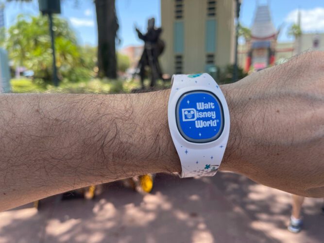 MagicBand+ with retro Walt Disney World logo on wrist at Disney's Hollywood Studios