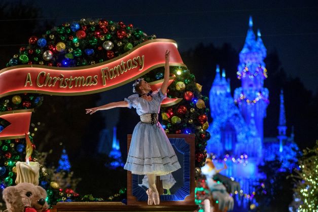 A dancer on a float in A Christmas Fantasy Parade at Disneyland