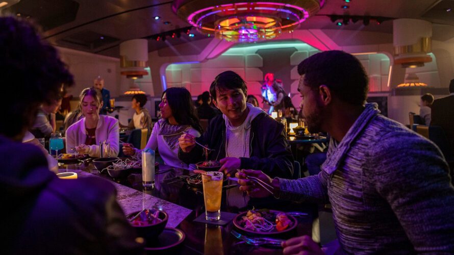 Passengers enjoy the Halcyon starcruiser dining experience in the Crown of Corella Dining Room in Star Wars: Galactic Starcruiser at Walt Disney World Resort in Lake Buena Vista, Fla. (Matt Stroshane, photographer)
