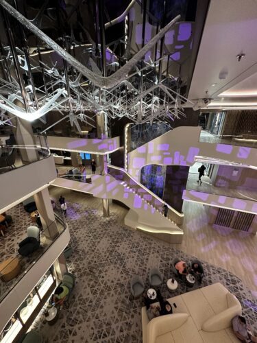 The multi-level lobby atrium on Norwegian Prima.