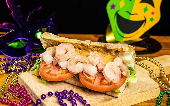 Universal Mardi Gras shrimp po boy sandwich