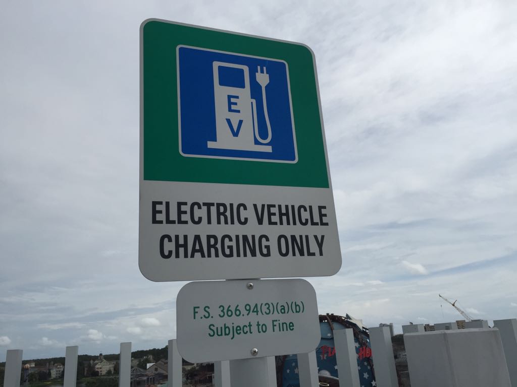 Where can I charge my electric vehicle at Walt Disney World?