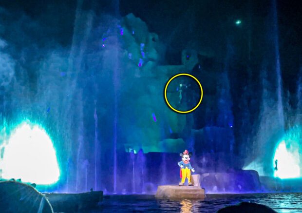 Split second view of Maleficent being lowered down during the Fantasmic! B-Mode finale. 