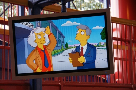 Doc Brown in The Simpsons Ride queue video