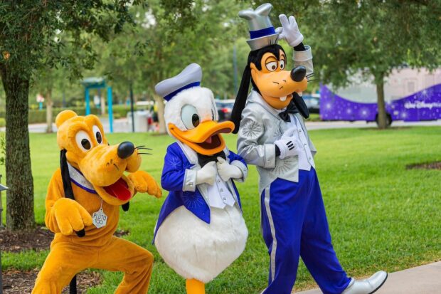 Pluto, Donald, and Goofy in DIsney100 outfits