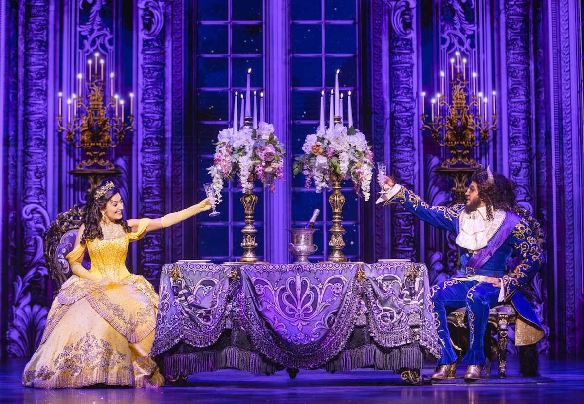 belle and the beast in the stage musical production of Beauty and the Beast