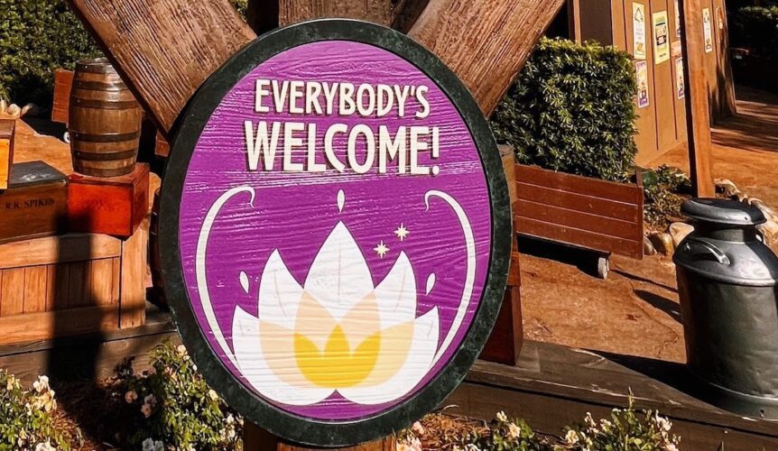 Tiana's Bayou Adventure "Everybody's welcome!" sign