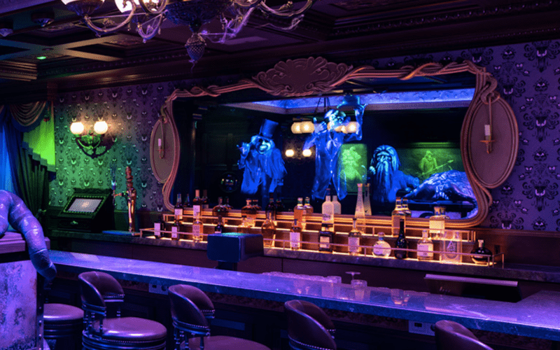 Hitchhiking Ghosts in mirror effect haunted mansion bar