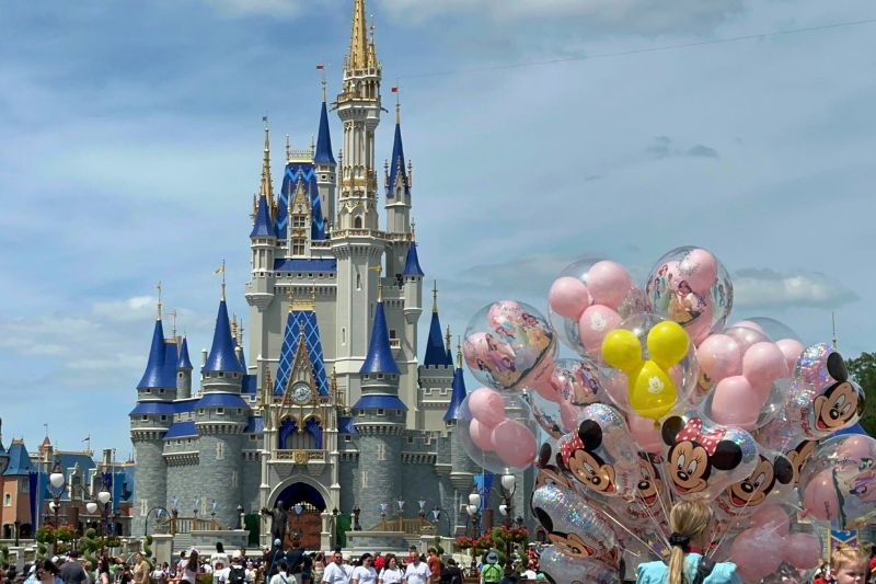 Cinderella Castle paint scheme complete April 2026 view from walking down Main Street 