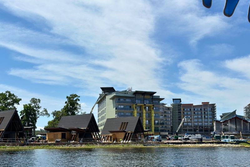Lakeshore Lodge lobby and east tower with a-frame cabins during construction April 2026