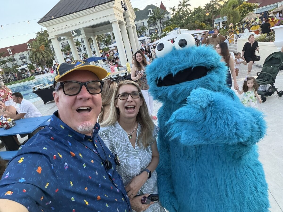 Attractions Magazine publisher and writers Matt and Jackie Roseboom with Cookie Monster. 