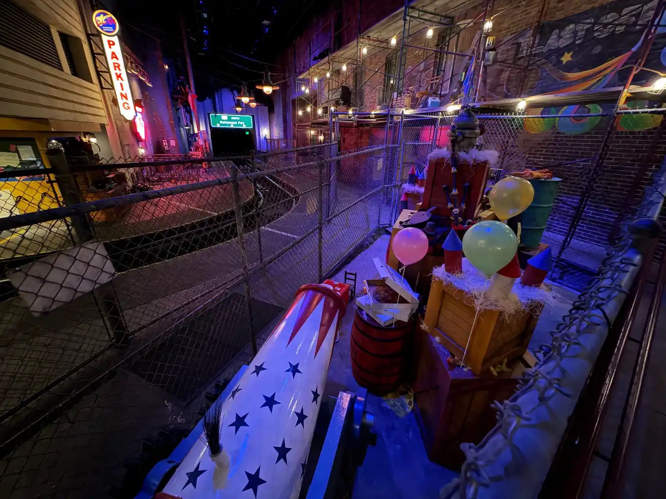 The Great Gonzo's crates, plane, and banner and canon