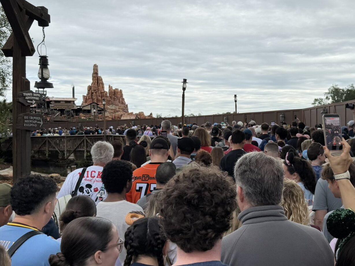 Crowds on bridge heading to Big Thunder Mountain Railroad Walt Disney World - Photo by Matt Roseboom