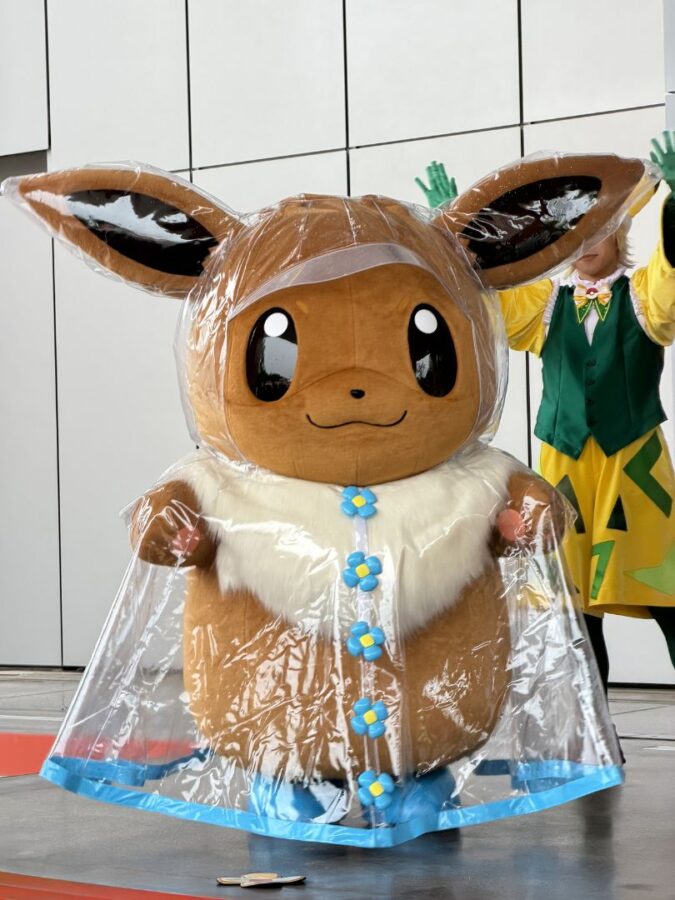Pikachu character during rain version of Pikachu and Eevee Bubble Carnival at PokéPark Kanto