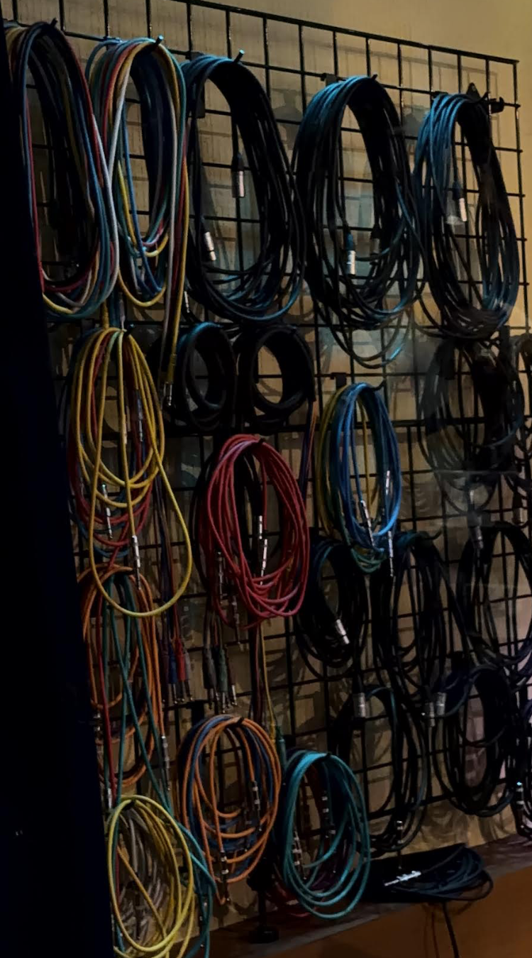 Audio cables in circles on wall