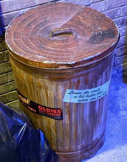 Jim Henson quote on trashcan in coaster queue