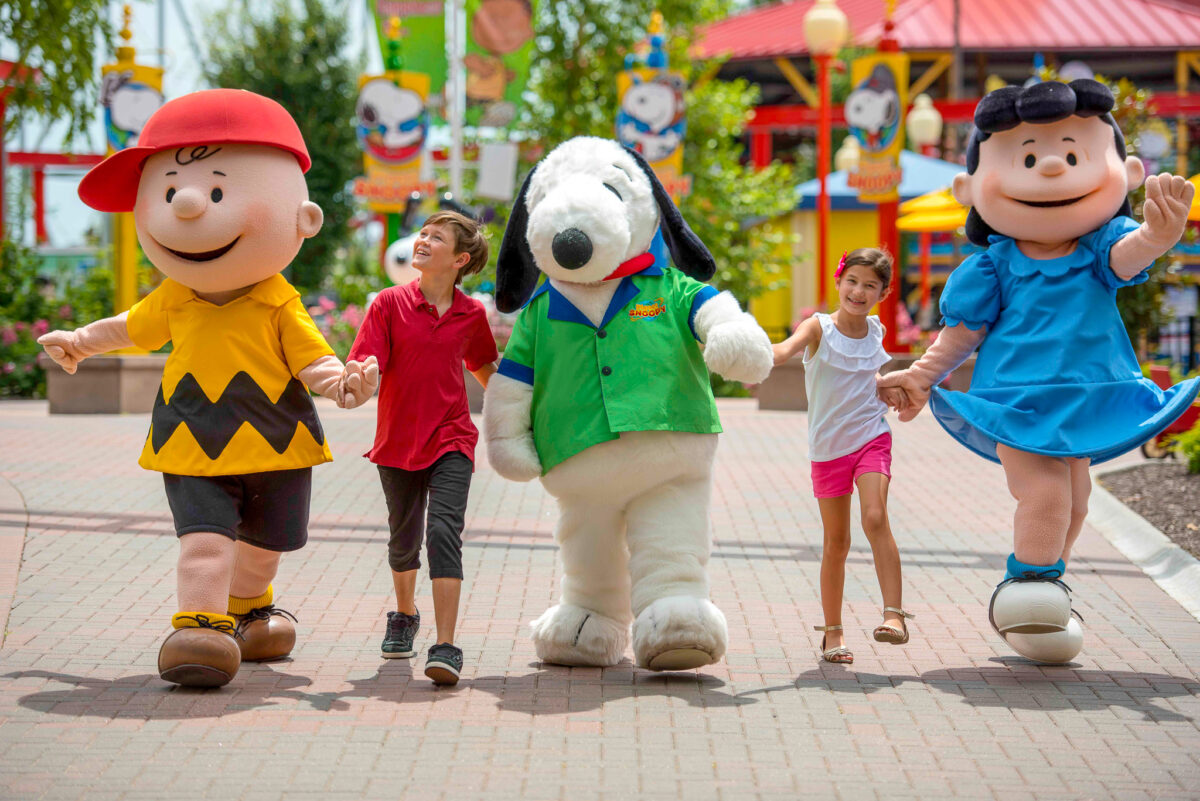 Charlie Brown characters with kids at Kings Dominion park