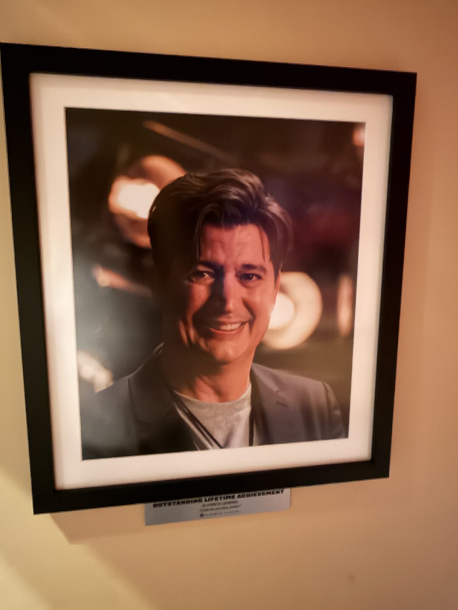 framed photo of Ken Marino