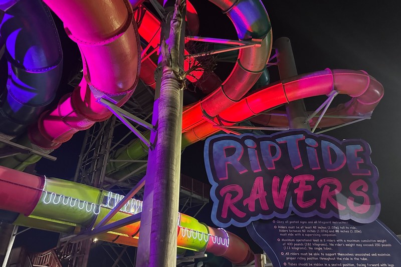 Riptide Ravers sign and slides at AquaGlow Aquatica Orlando - Photo by Dani Meyering