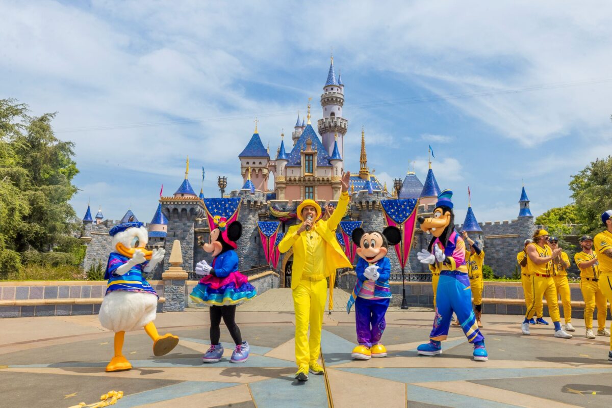 Savannah Bananas at Disneyland in front of castle with disney characters