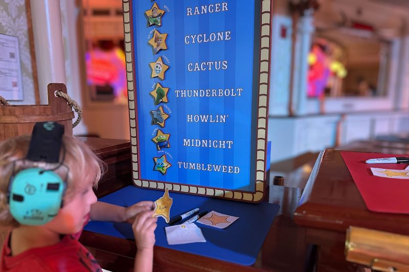 Young boy makes a deputy badge Jessie's Roundup Disney Cool Kids' Summer