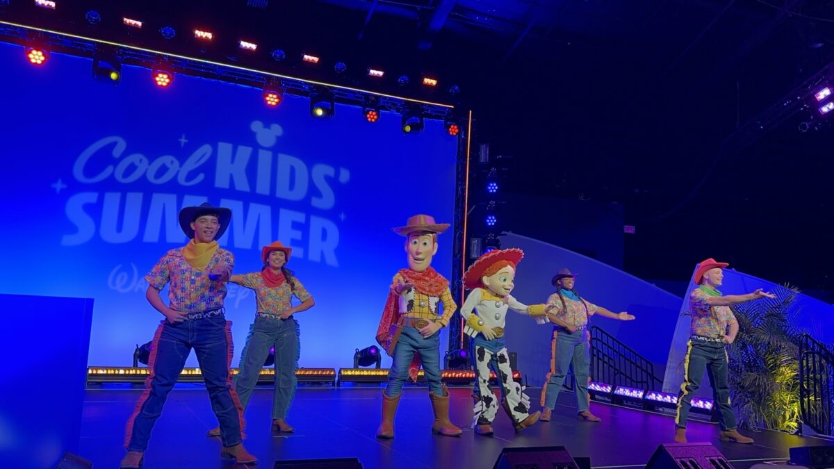 Jessie and Woody characters perform on stage during a Disney Cool Kids’ Summer performance 
