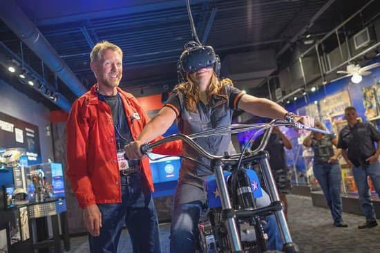 guest on a 4D virtual reality motorcycle