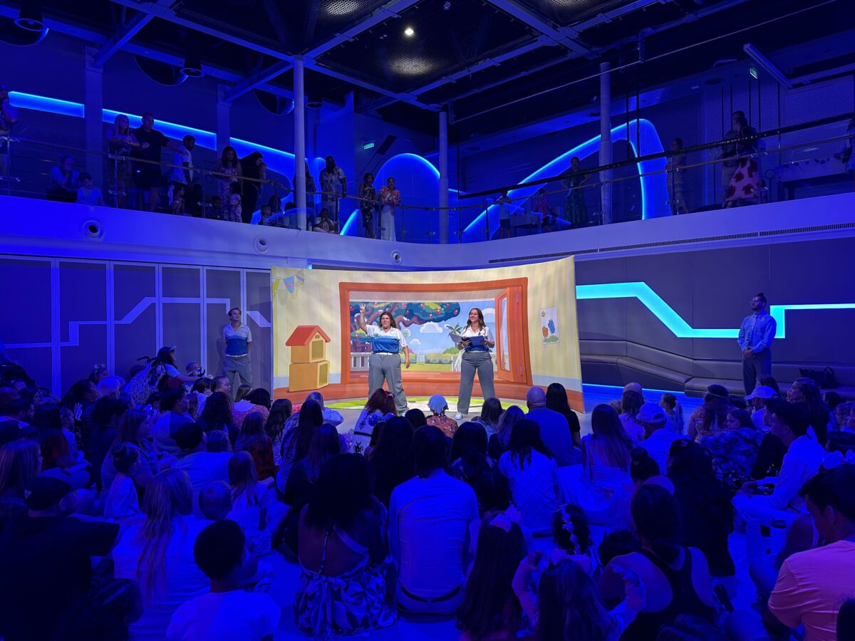 Bluey and Bingo and hosts start the Pyjama Party Disney Wish in Hero Zone