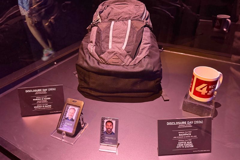 Security badge backpack coffee mug props from the actual movie Disclosure Day at Universal Studios Florida 