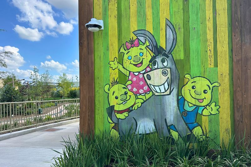Donkey and triplets mural at Shrek ride exit