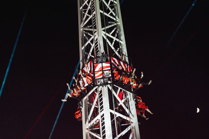 Guests riding Area 15 Eyedropper Tower ride