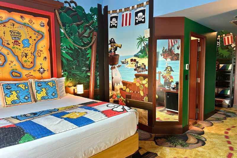 King bed looking toward kids' nook Pirate Island Hotel