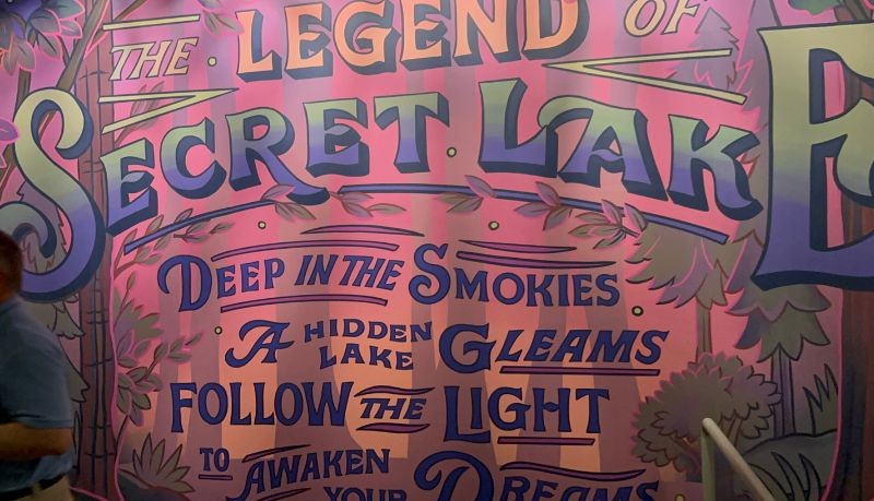 Dollywood NightFlight Expedition Secret Lake mural in queue