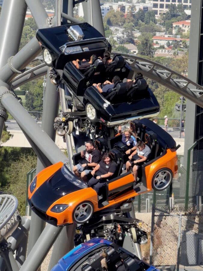 Fast & Furious Hollywood Drift coaster vehicles facing different directions