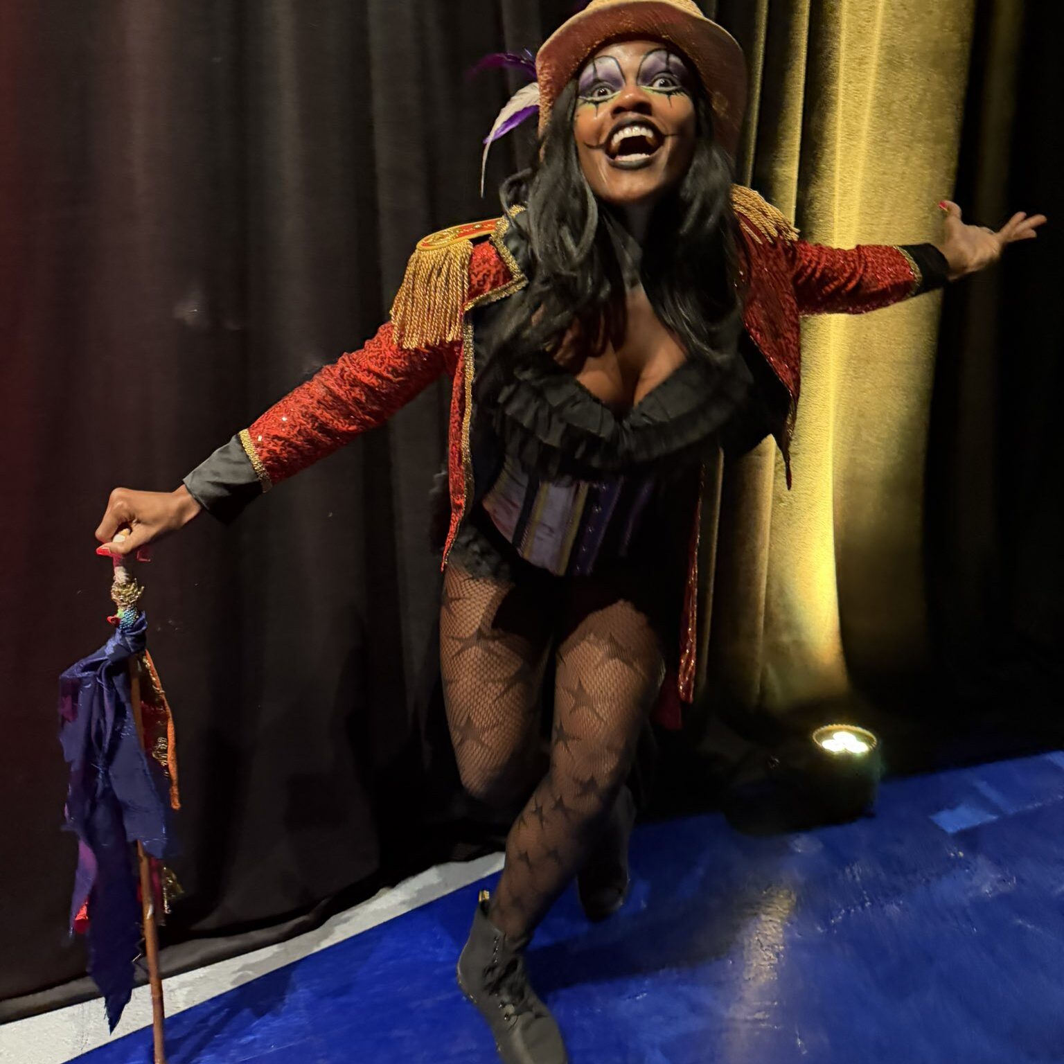 a circus themed performer welcomes media