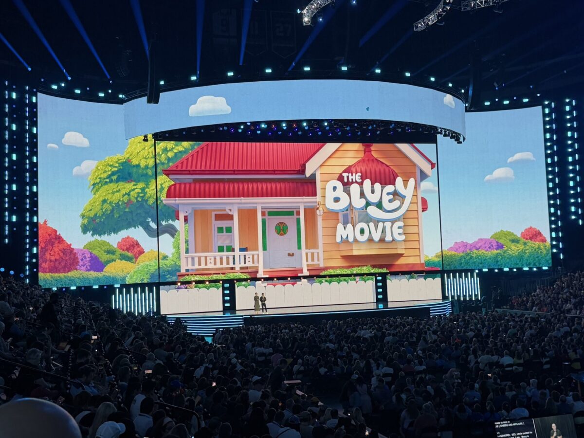 the bluey movie 3-d graphic on screen on stage at D23 presentation