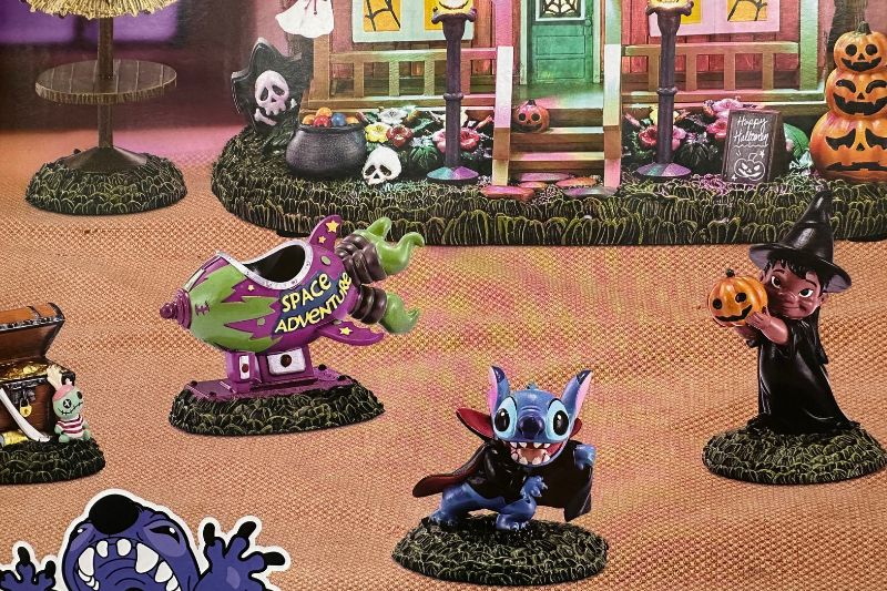 Disney Stitch Halloween Village at BJ's Wholesale Club box zoomed in on Lilo and Stitch