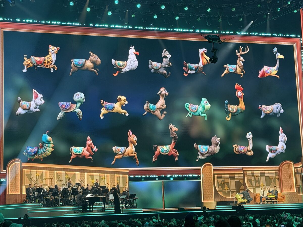 El Carousel de los Animalitos animal ride vehicles on screen for D23