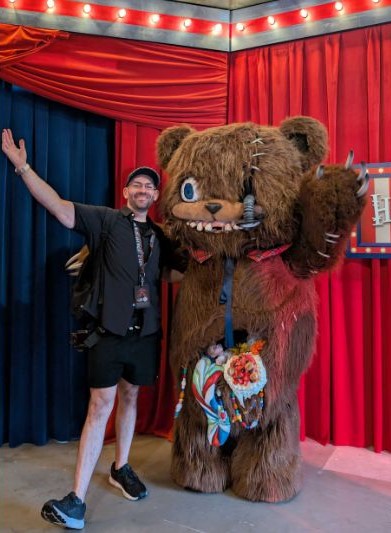 Philip Hernandez poses with HamiKuma character at Halloween Horror Nights Orlando
