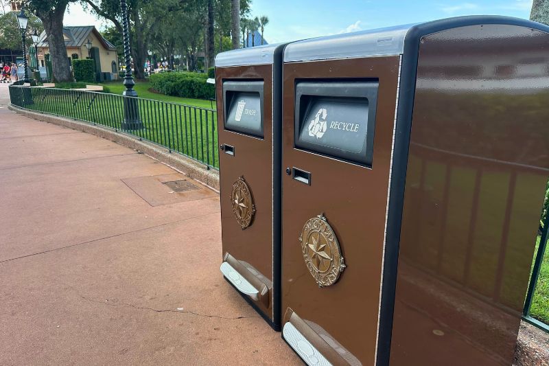 New trashcans near food ledge placed ahead of Epcot International Food & Wine Festival near Mexico