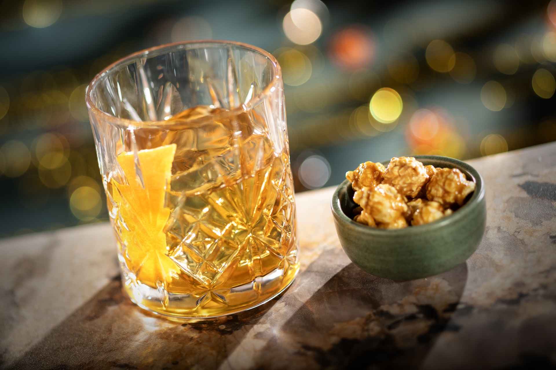 Old Fashioned cocktail with caramel corn