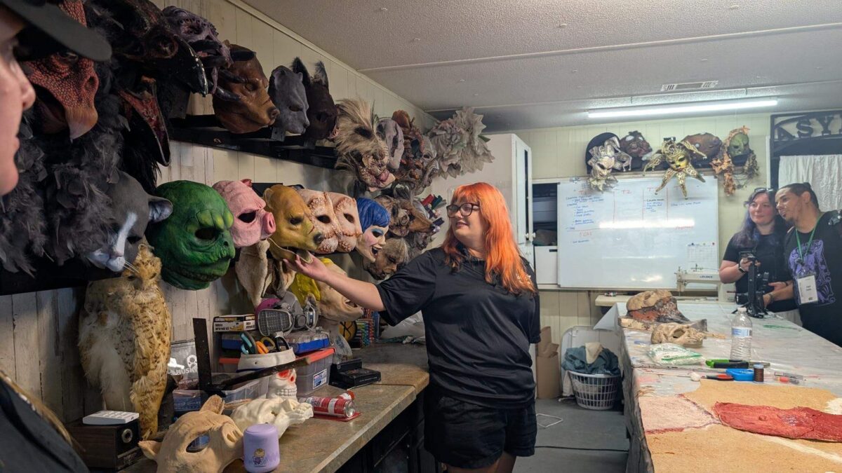 A Petrified Forest masks in a trailer shown by a staff member