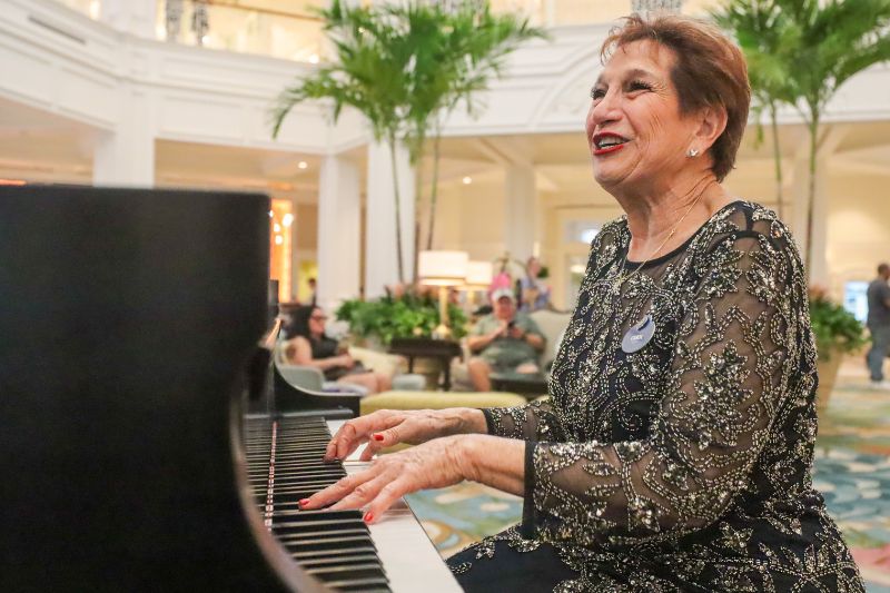Carol playing piana at Disney's Grand Floridian