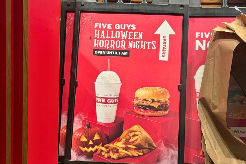 Five Guys Halloween Horror Nights themed sign