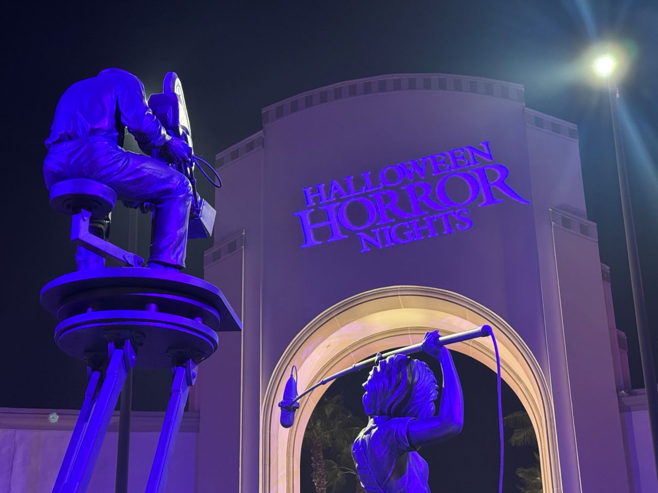 Halloween Horror Nights logo projected on the Universal Studios Hollywood arch