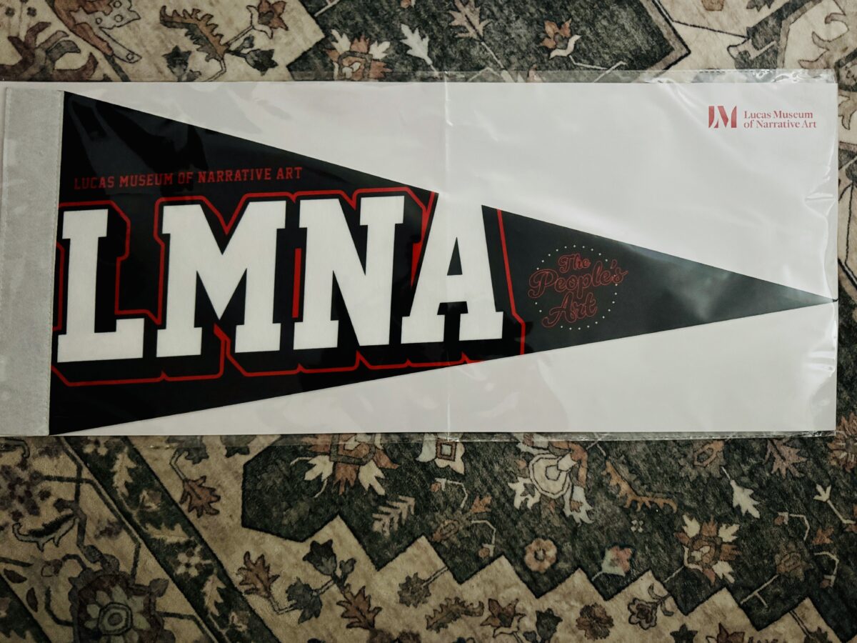 A pennant from the Lucas Museum of Narrative Art, featuring the phrase "The People's Art"